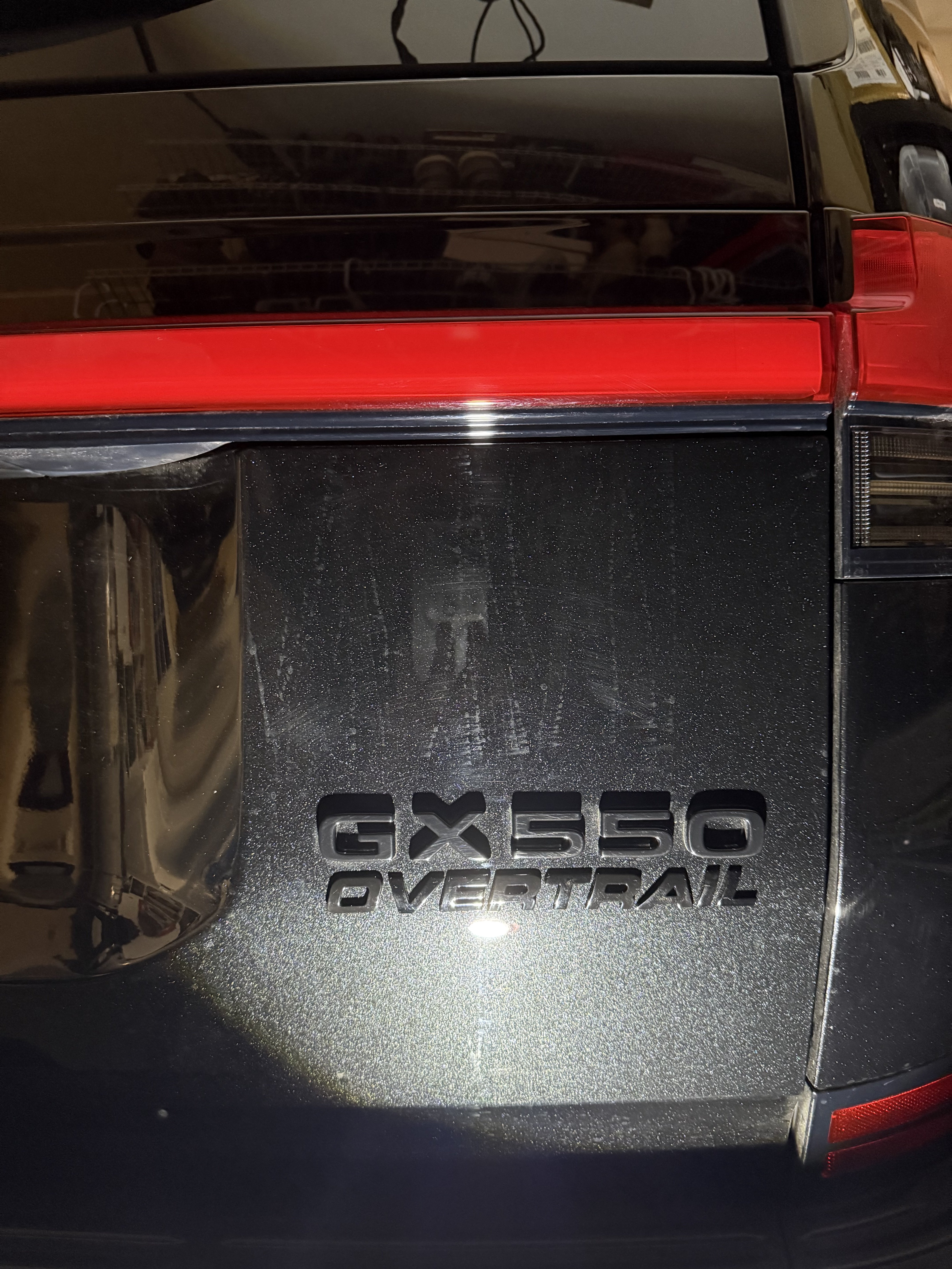 Overtrail badge on rear door installed